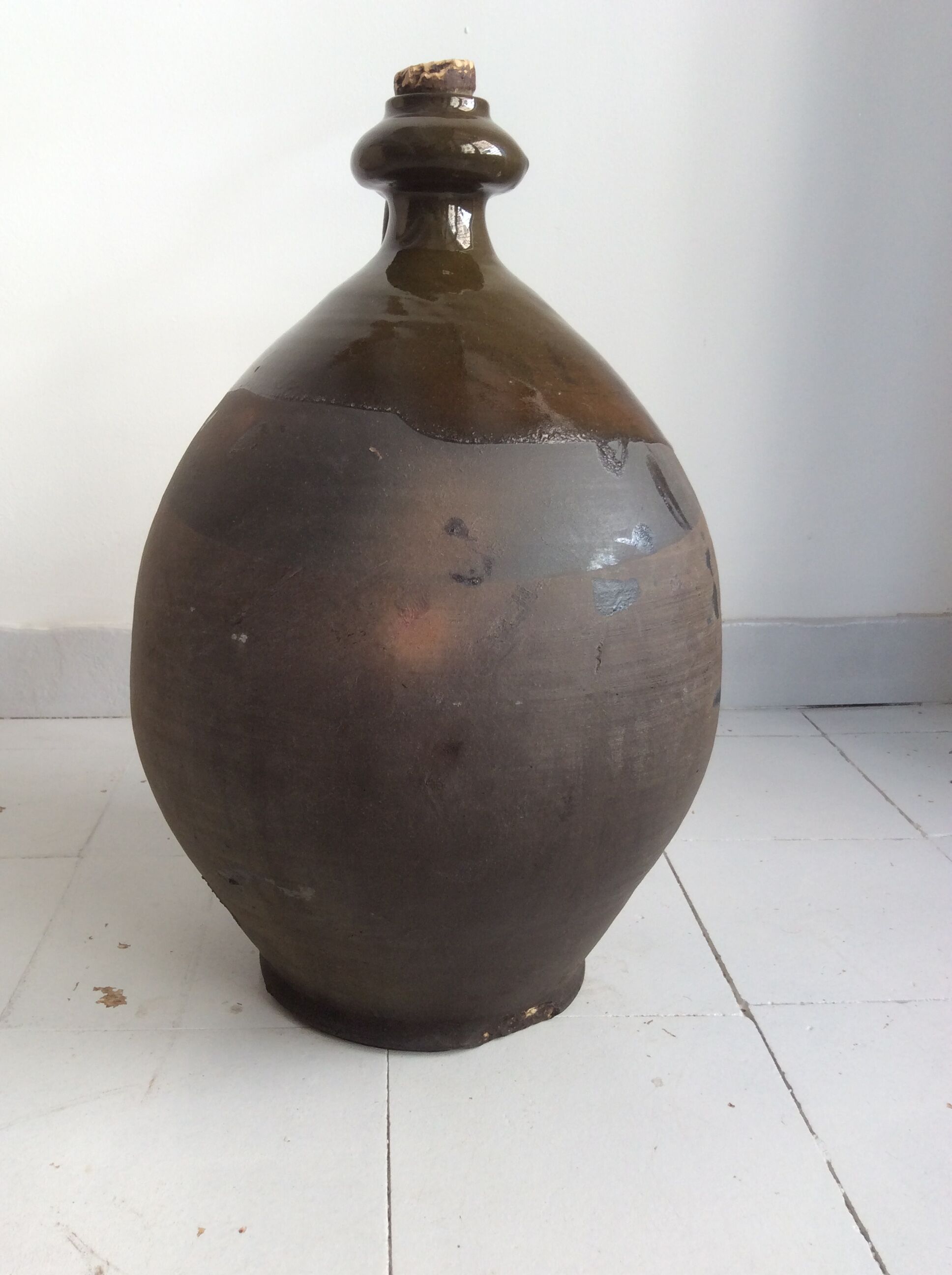Old terracotta jug glazed Provençal