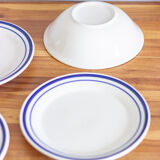 4 blue bordered dessert plates and a matching bowl