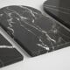 Small curved black marble plate