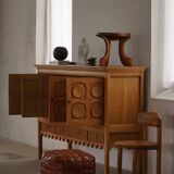 Mid-20th century pouf / ottoman cube in patinated brown leather, 1960s.