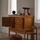 Mid-20th century pouf / ottoman cube in patinated brown leather, 1960s.