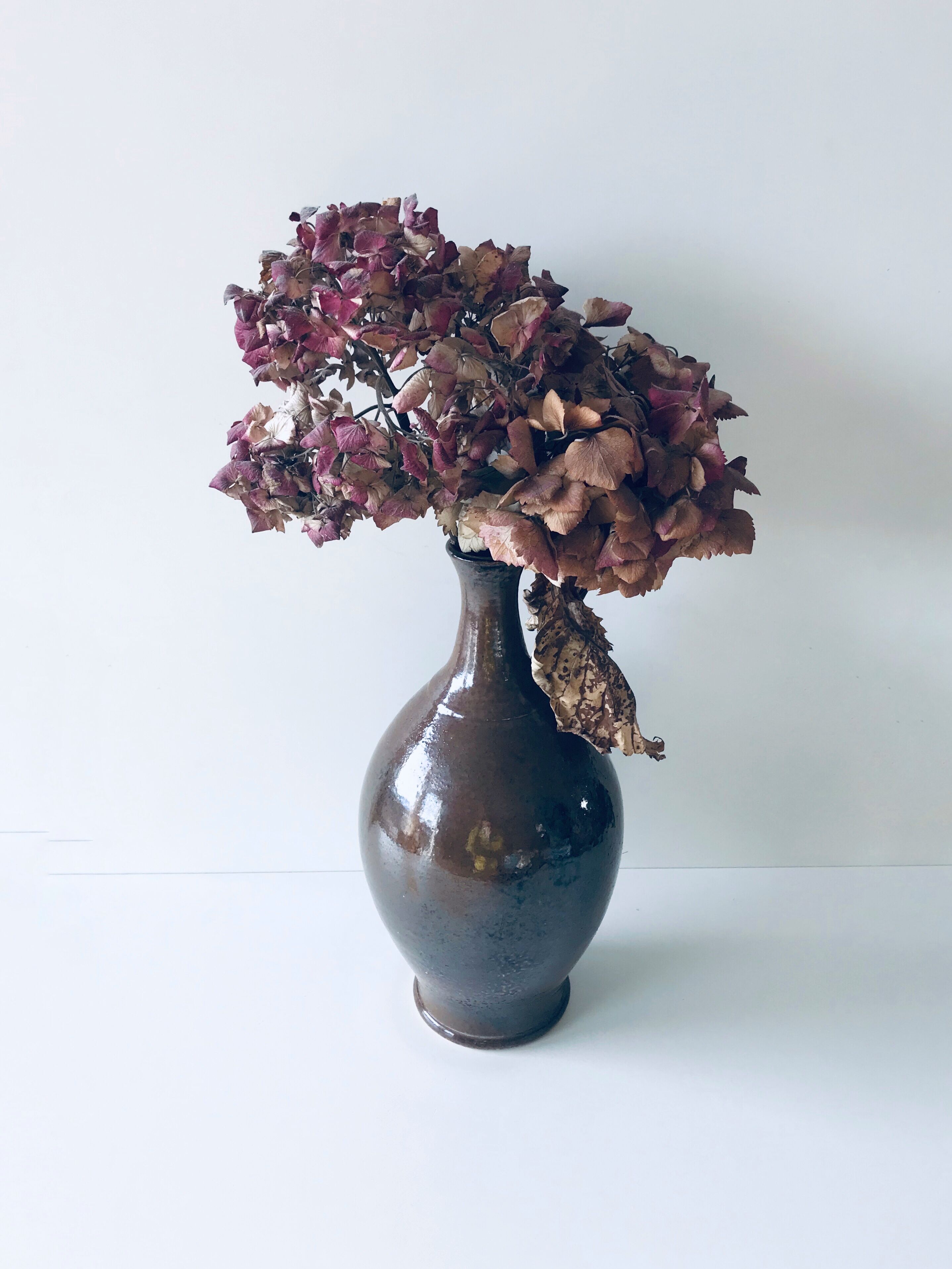 Enamelled sandstone vase