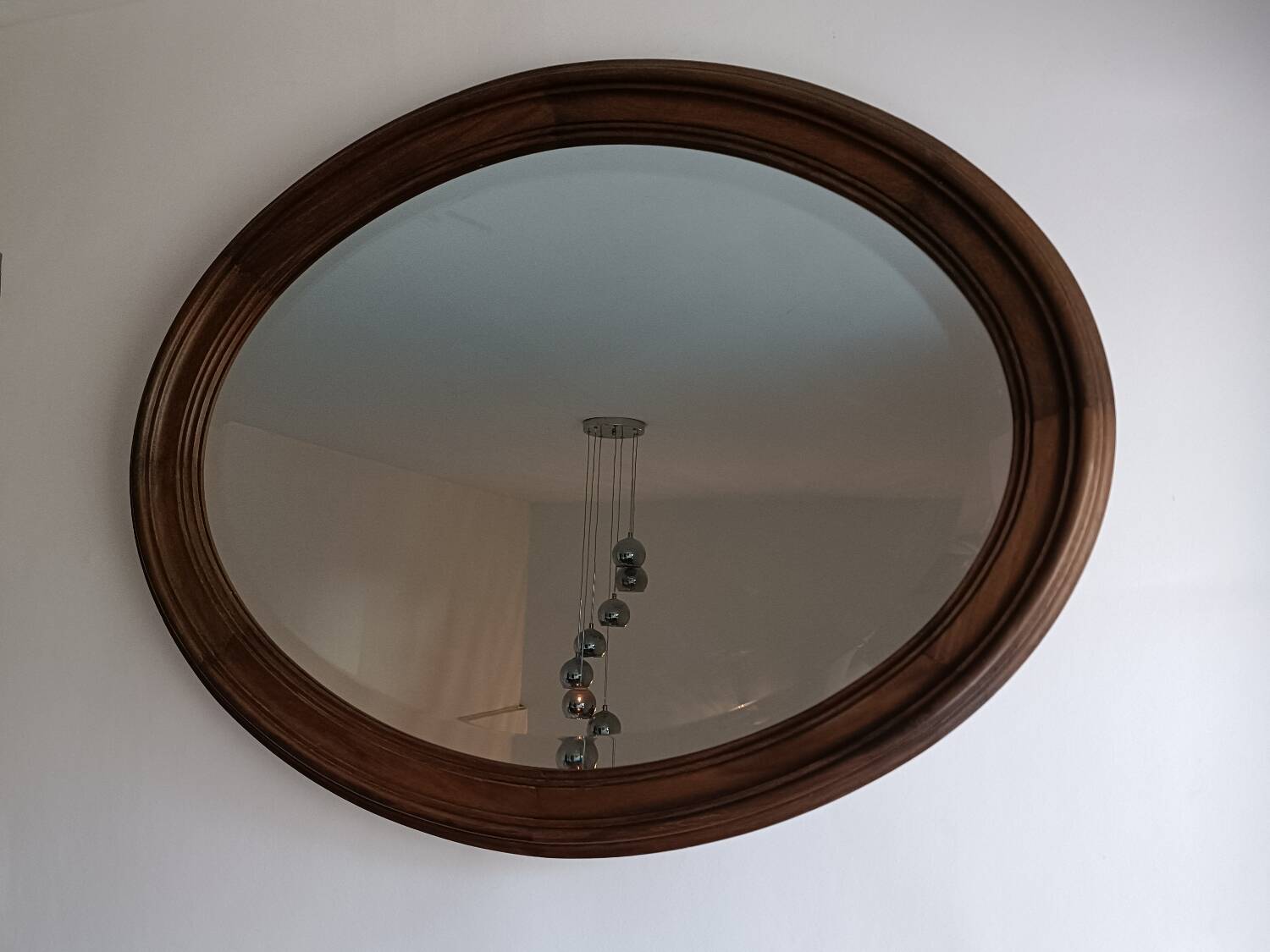 Antique oval beveled mirror