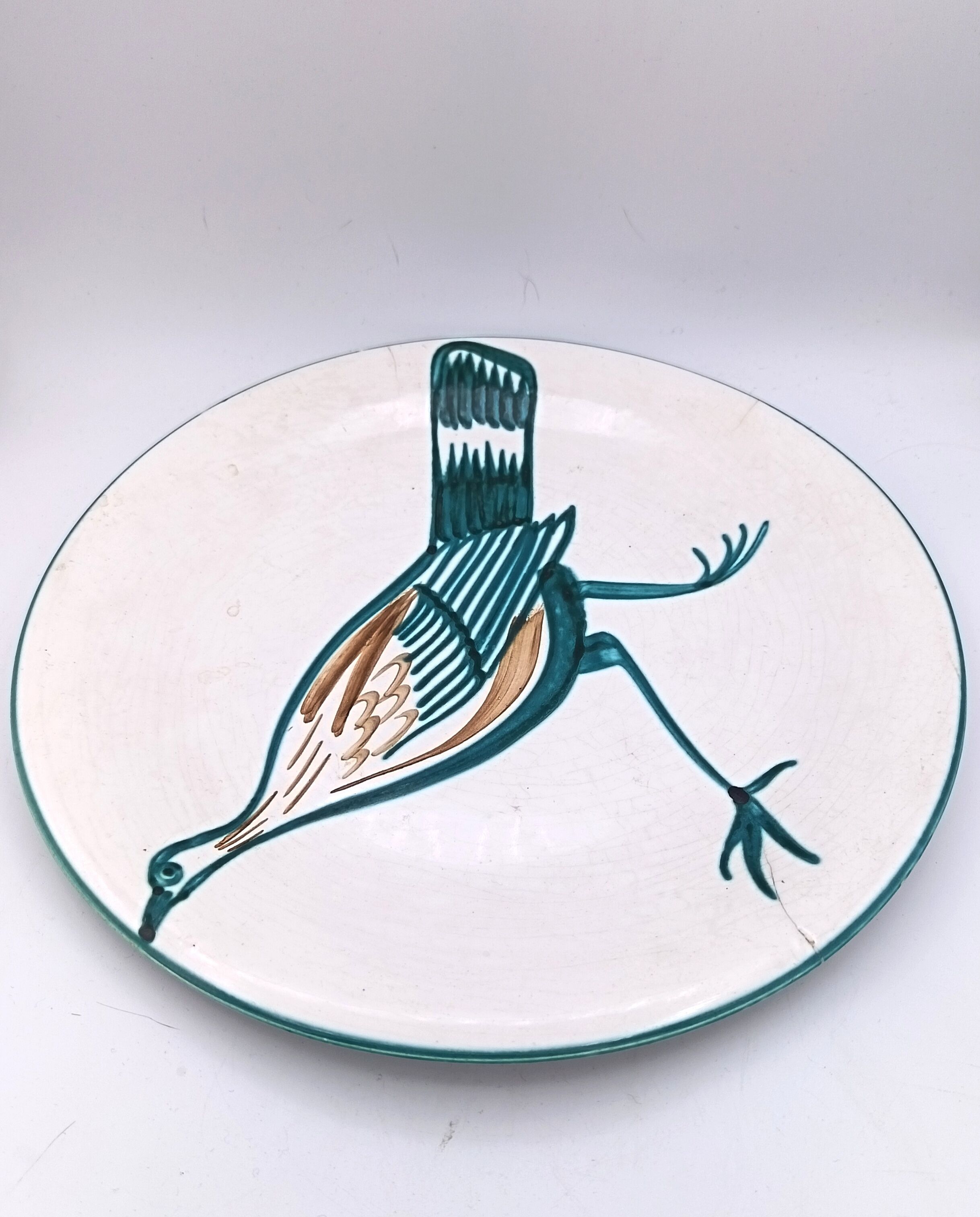 Large ceramic dish signed Roger Picault