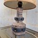 Ceramic lamp with openwork design and double lighting