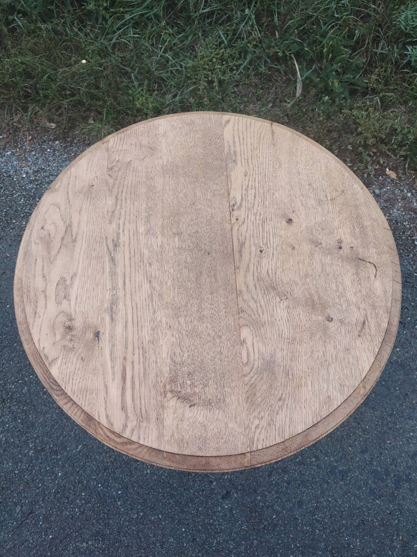 Oak gueridon in the style of Charles Dudouyt, 1940-50.