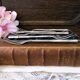 Five silver-plated metal appetizer forks with bamboo-style handles