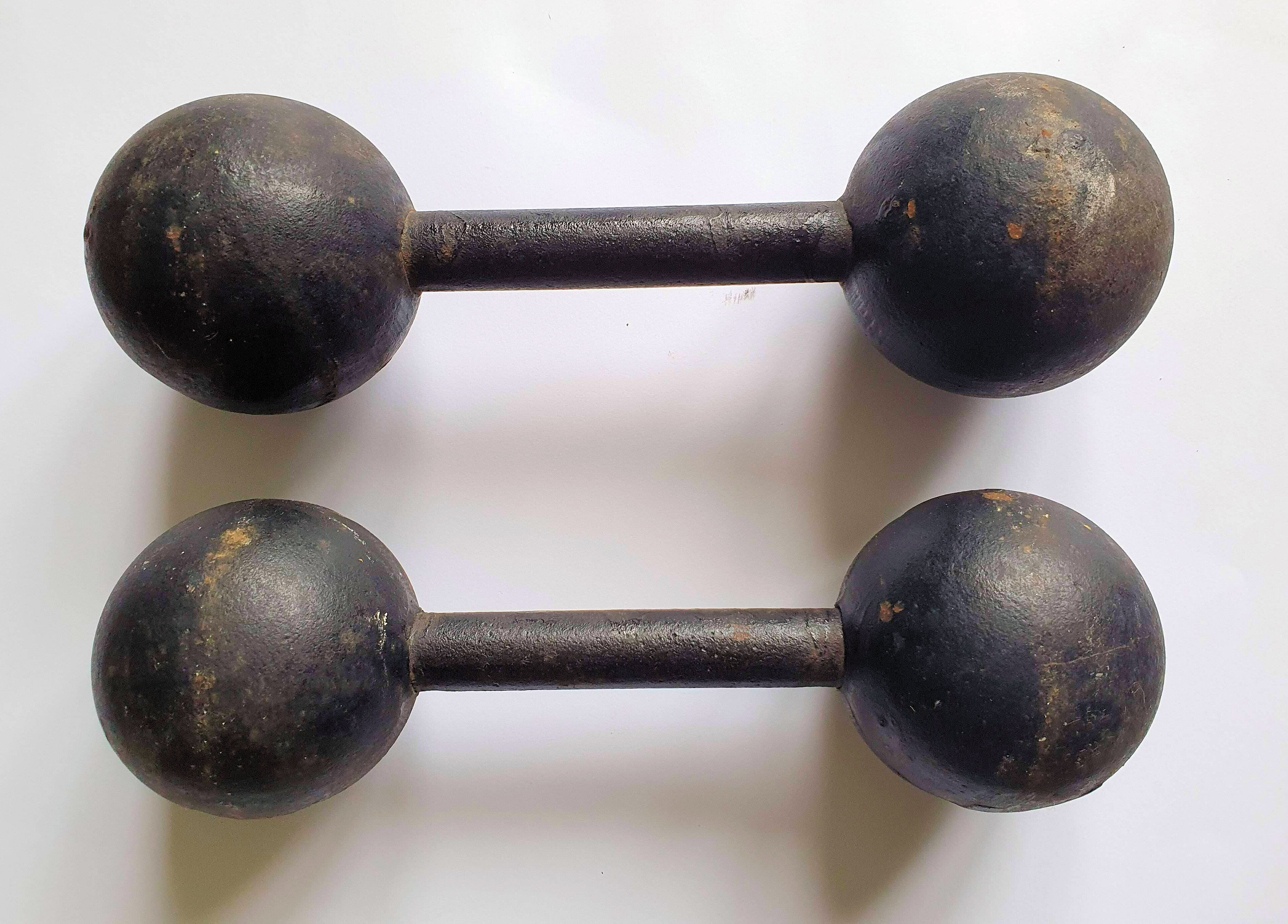 Vintage cast iron dumbbells