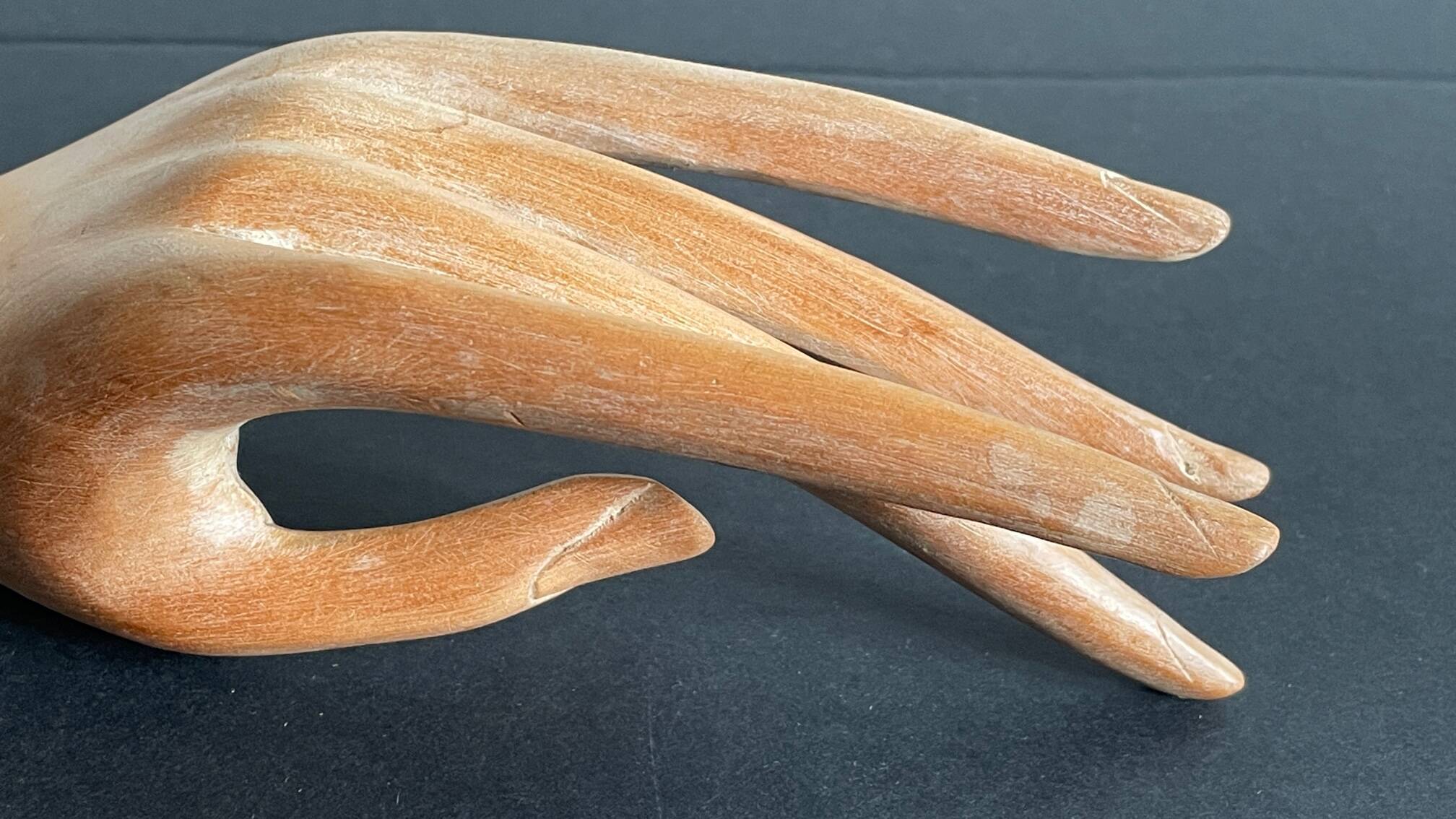 Wooden hand sculpture