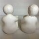 Pair of bookends with a matte white glaze for children.