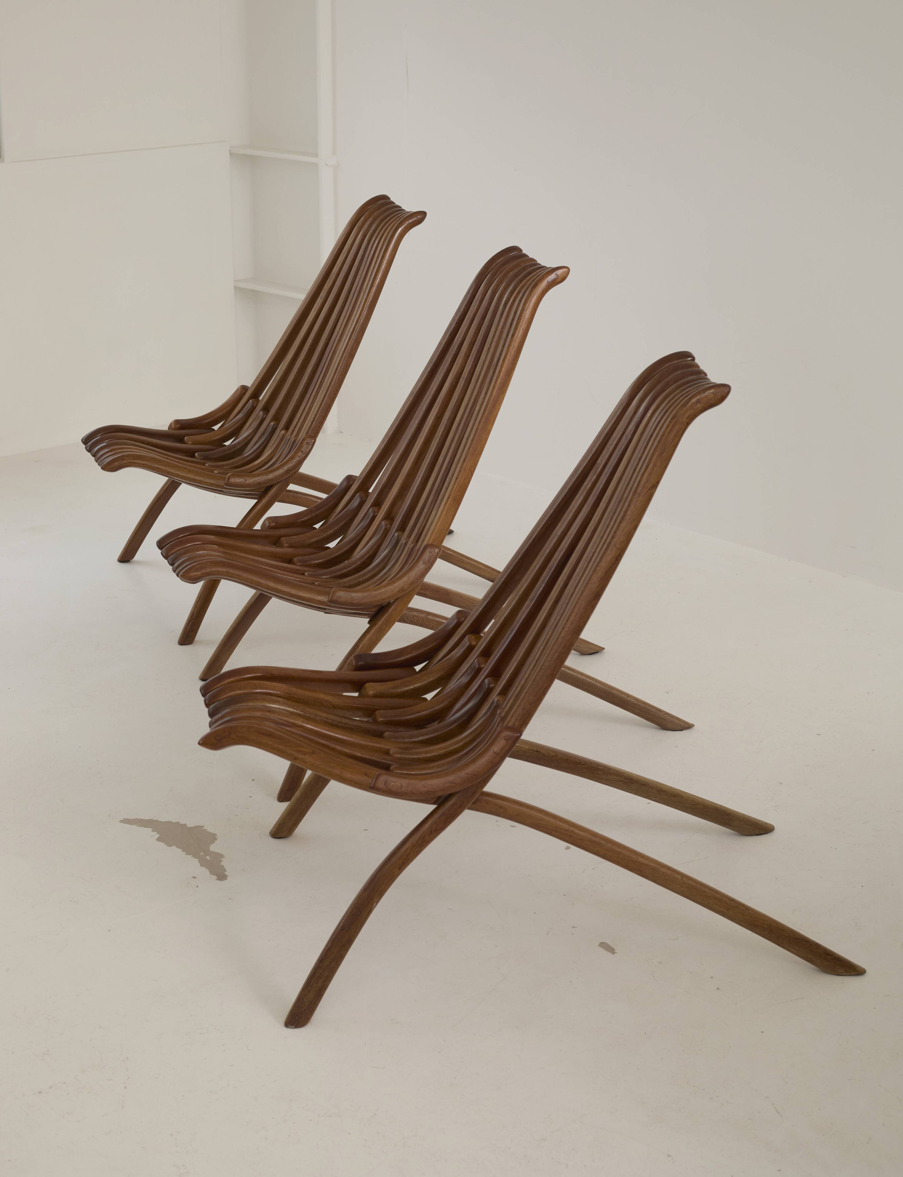 Handcrafted folding chair in solid wood (Iroko) vintage circa 1970.