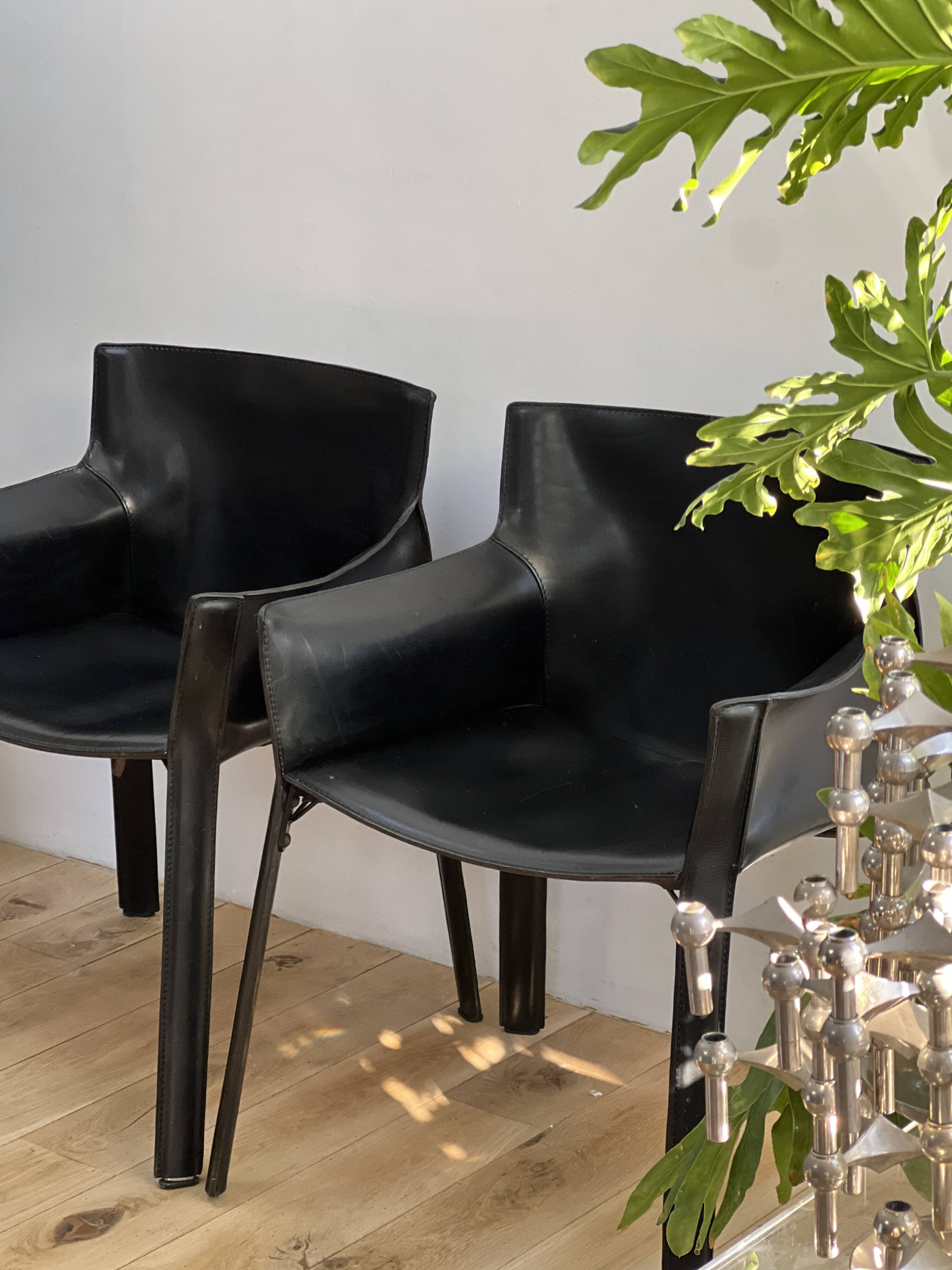Set of 6 black leather armchairs from the 1970s
