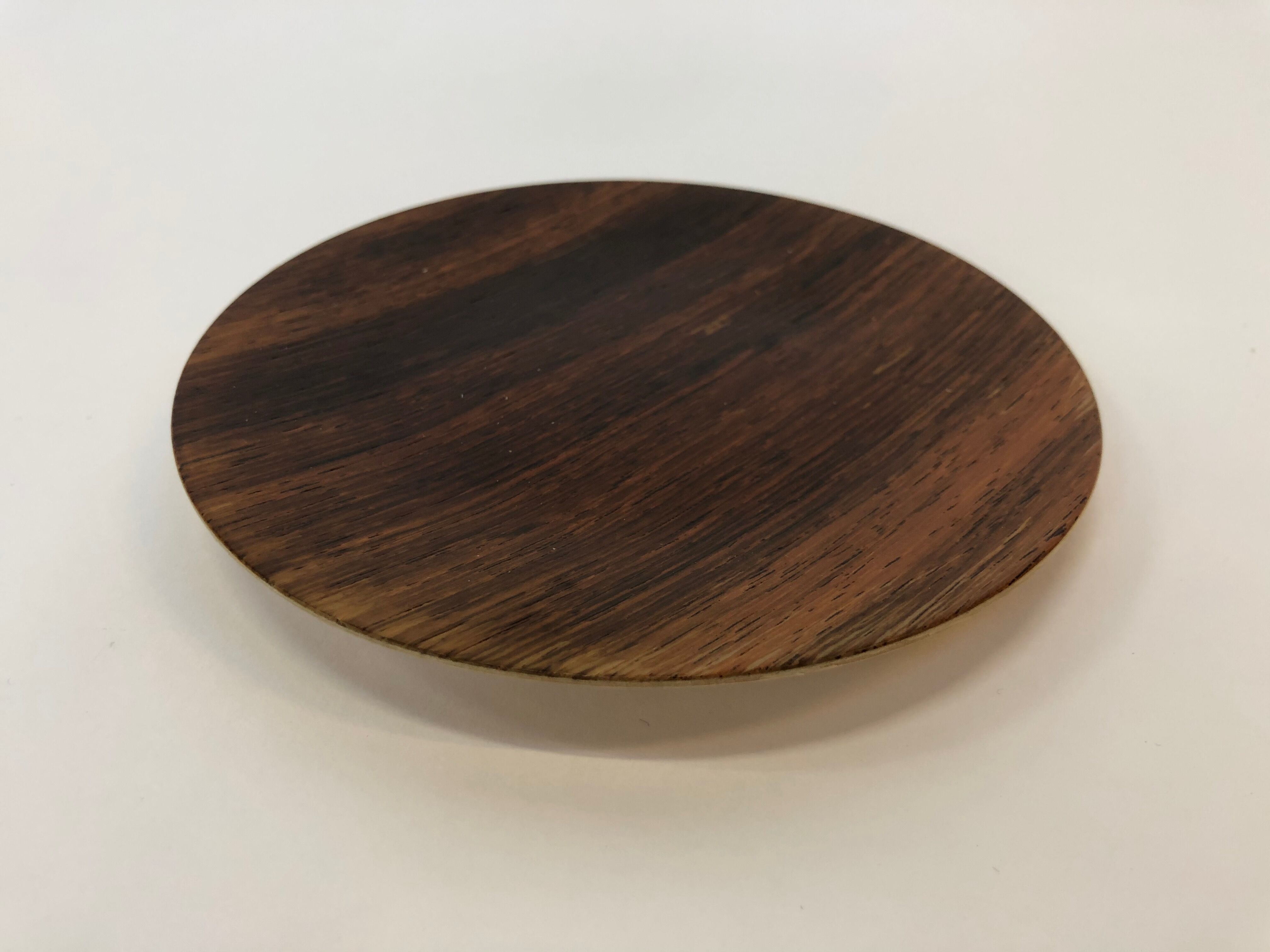 Vintage wooden cups and saucers in teak