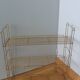 String shelf in golden metal wires