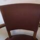 Skai chair binds wine and wooden footpieces and armrests