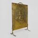 Fireplace screen in repoussé brass with a sailing boat. 1960s.