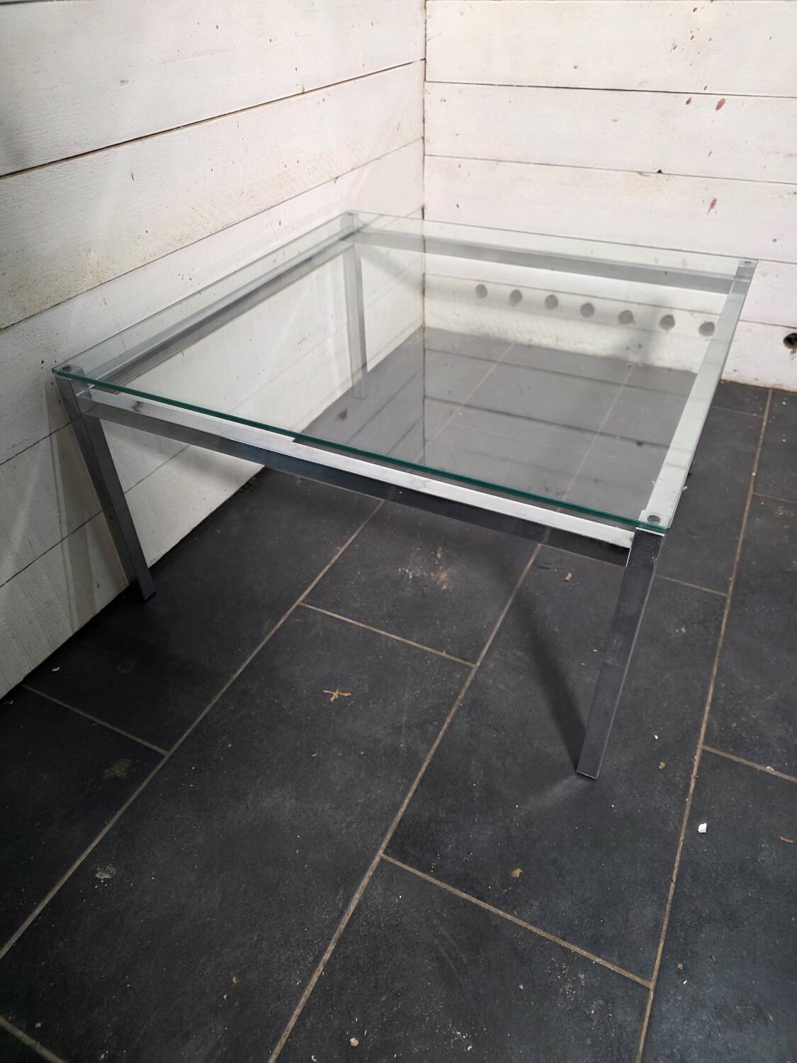 Chrome metal coffee table with a glass top from the 1970s.