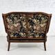 Wingback 2-seater sofa in carved wood, cane and fabric