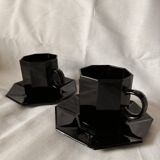 Set of 2 arcoroc black glass coffee cups with underplates