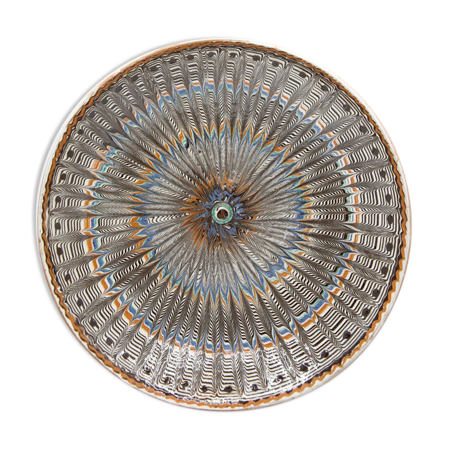 Traditional Romanian plate with psychedelic motifs from Horezu