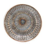 Traditional Romanian plate with psychedelic motifs from Horezu