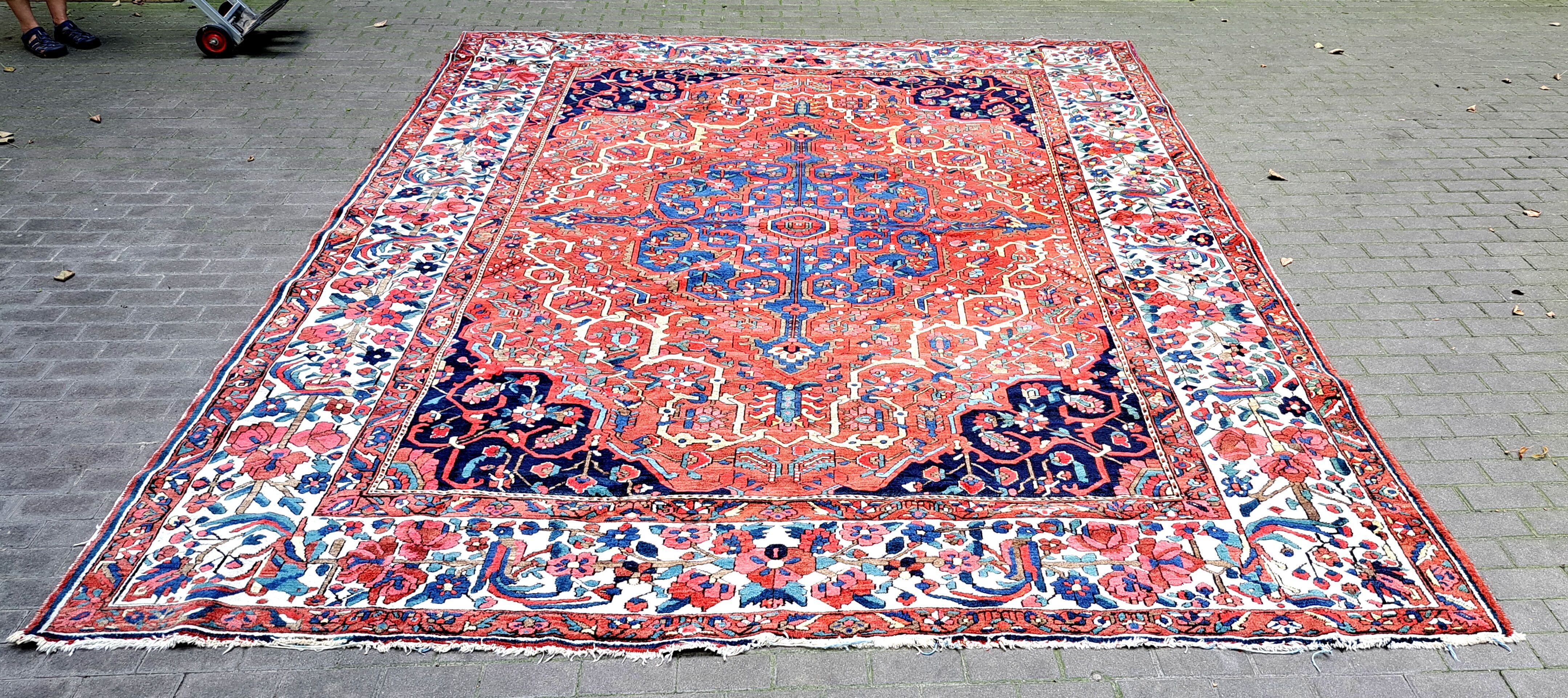 Ancient Persian carpet made of hand-woven wool. Very good condition.