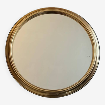 Round golden mirror