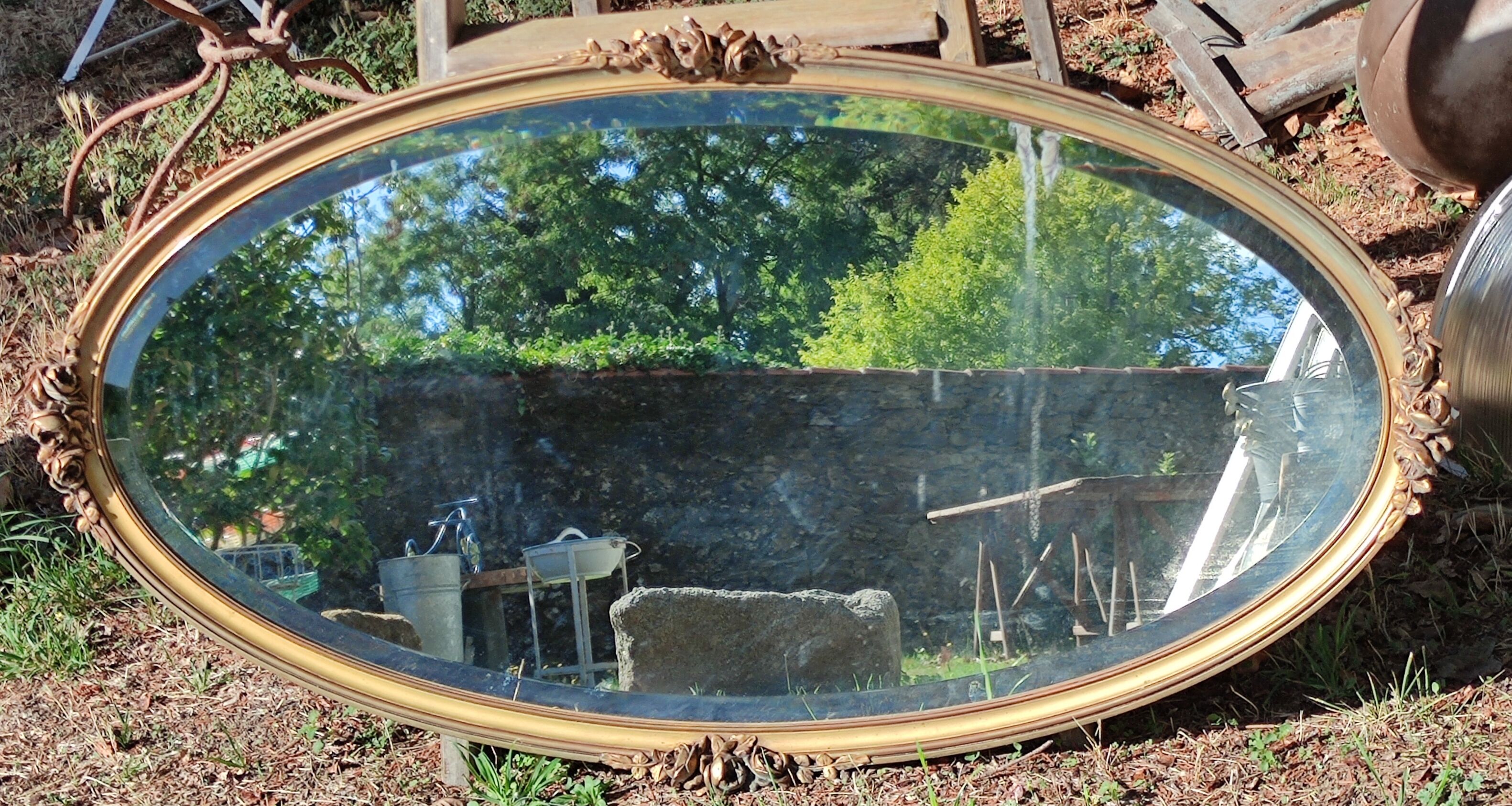 Ancien miroir ovale décor floral