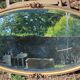 Ancien miroir ovale décor floral