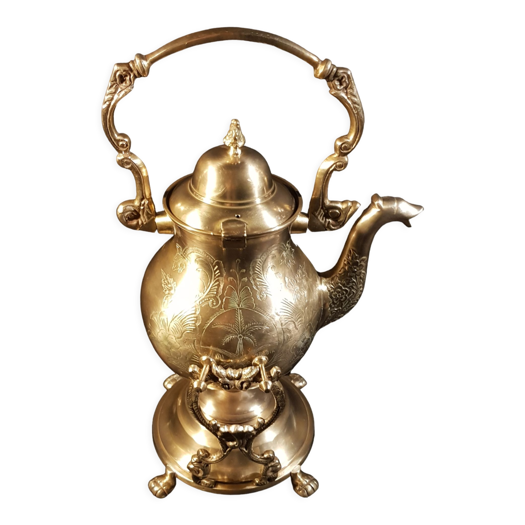 Oriental teapot on its support