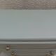 1950s commode enhanced in verdigris.