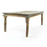 Carved and studded wooden table