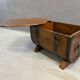 Oak barrel-shaped storage chest with black metal straps, 1930s-1940s.
