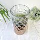 Vintage glass vase with geometric pattern in rose gold gradient