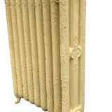 Radiateur ancien sur pieds a neuf lames fleuries en fonte de fer XX siècle