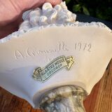 Bust of a woman signed Arnaldo Giannelli dated 1972.