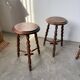 Set of 4 turned oak stools.
