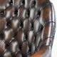 Brown cow leather Chesterfield office chair on wheels in English style