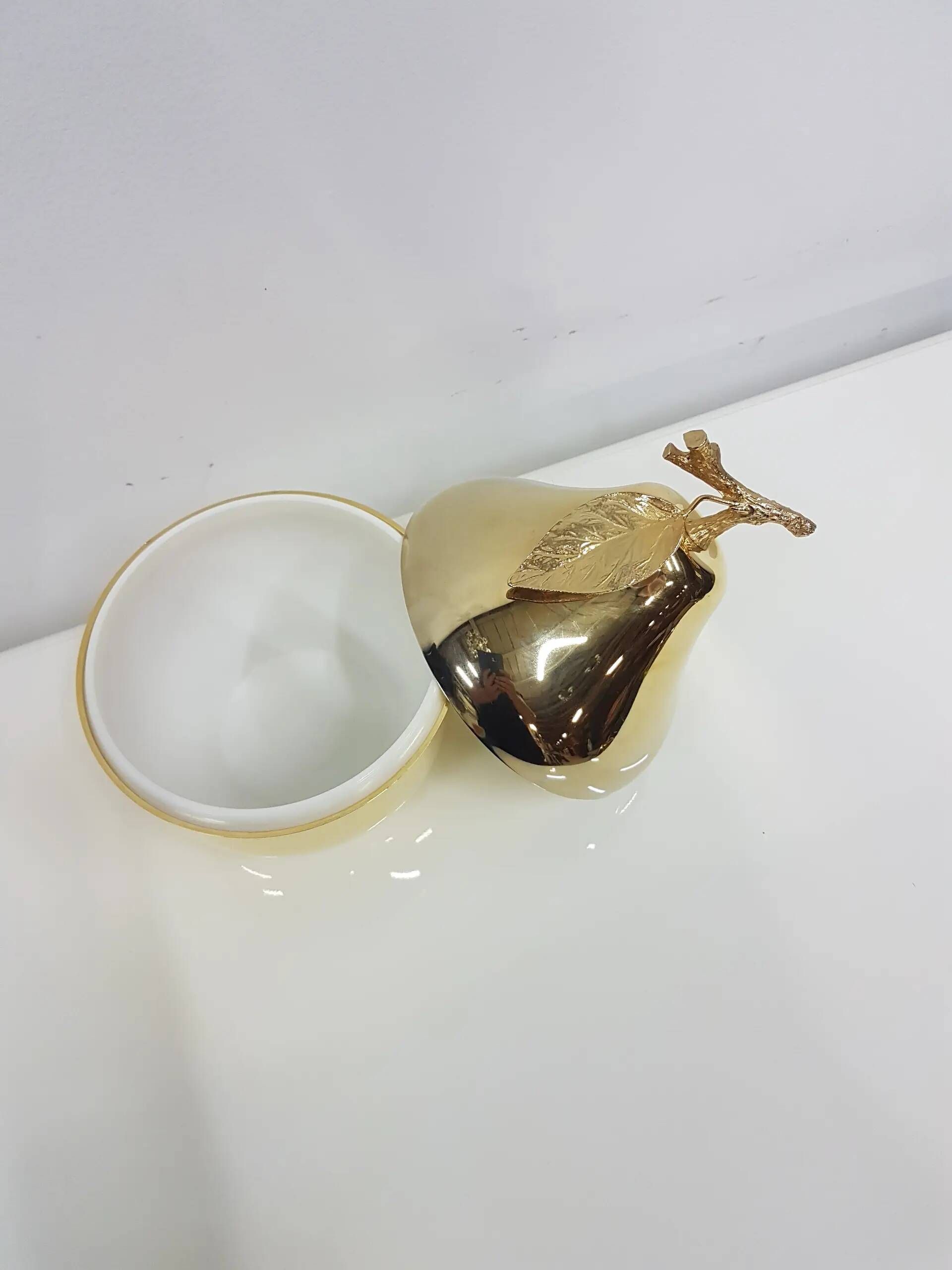 "Pear" ice bucket, gold-colored, gold-finished material, designed by H. Tur