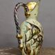 Ceramic jug with fish decoration
