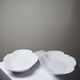 Vintage duo of Chastagner Limoges serving dishes, white rocaille porcelain.