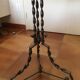Round and antique metal side table