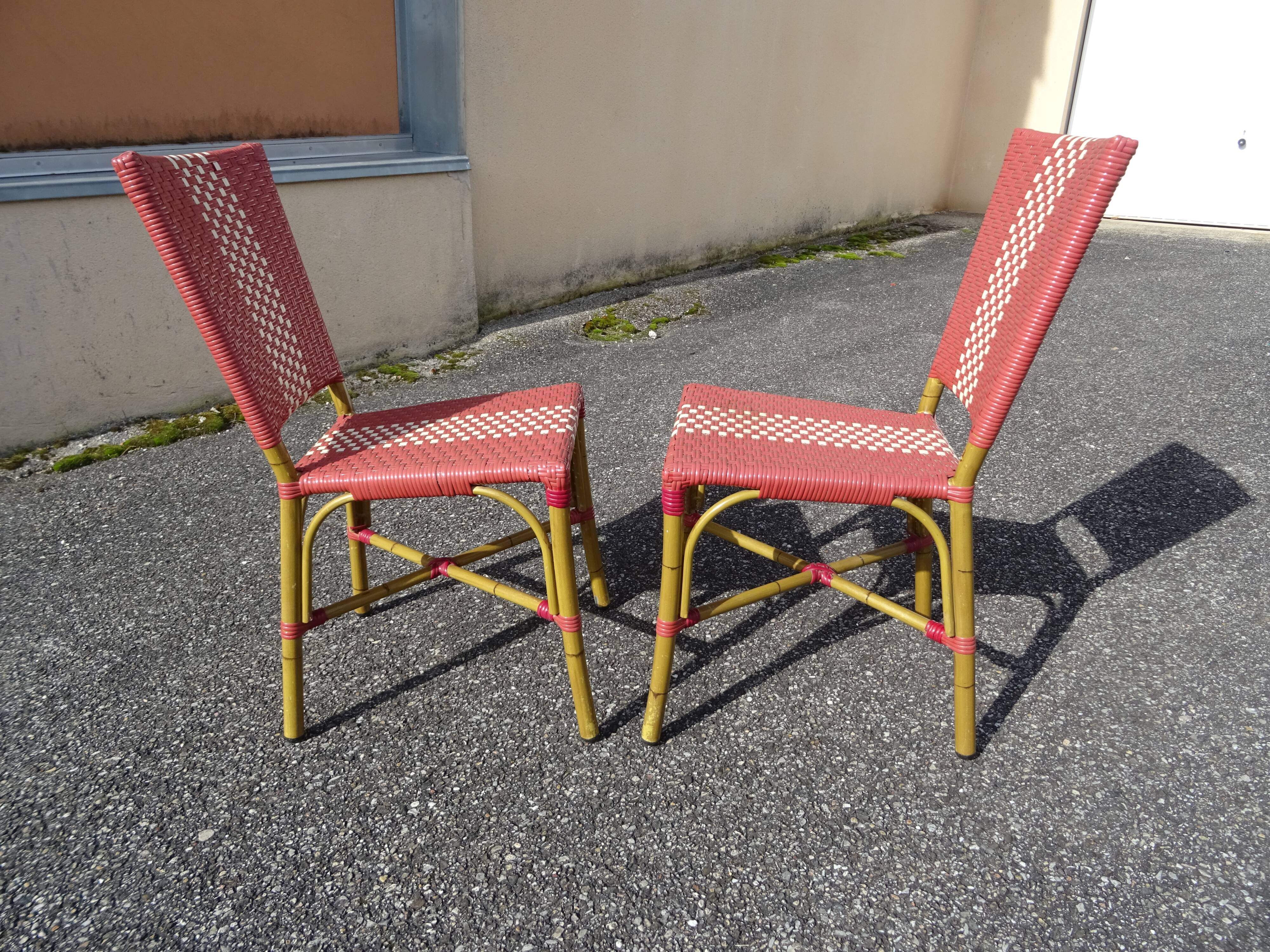 Pair of vintage Parisian bistro chairs