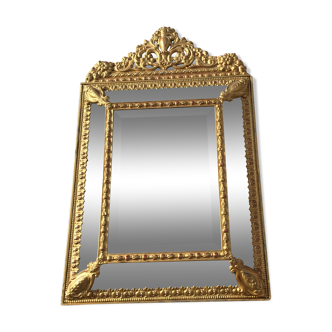 Former mirror beveled to shield closed, in gilded wood, 87 x 54 cm