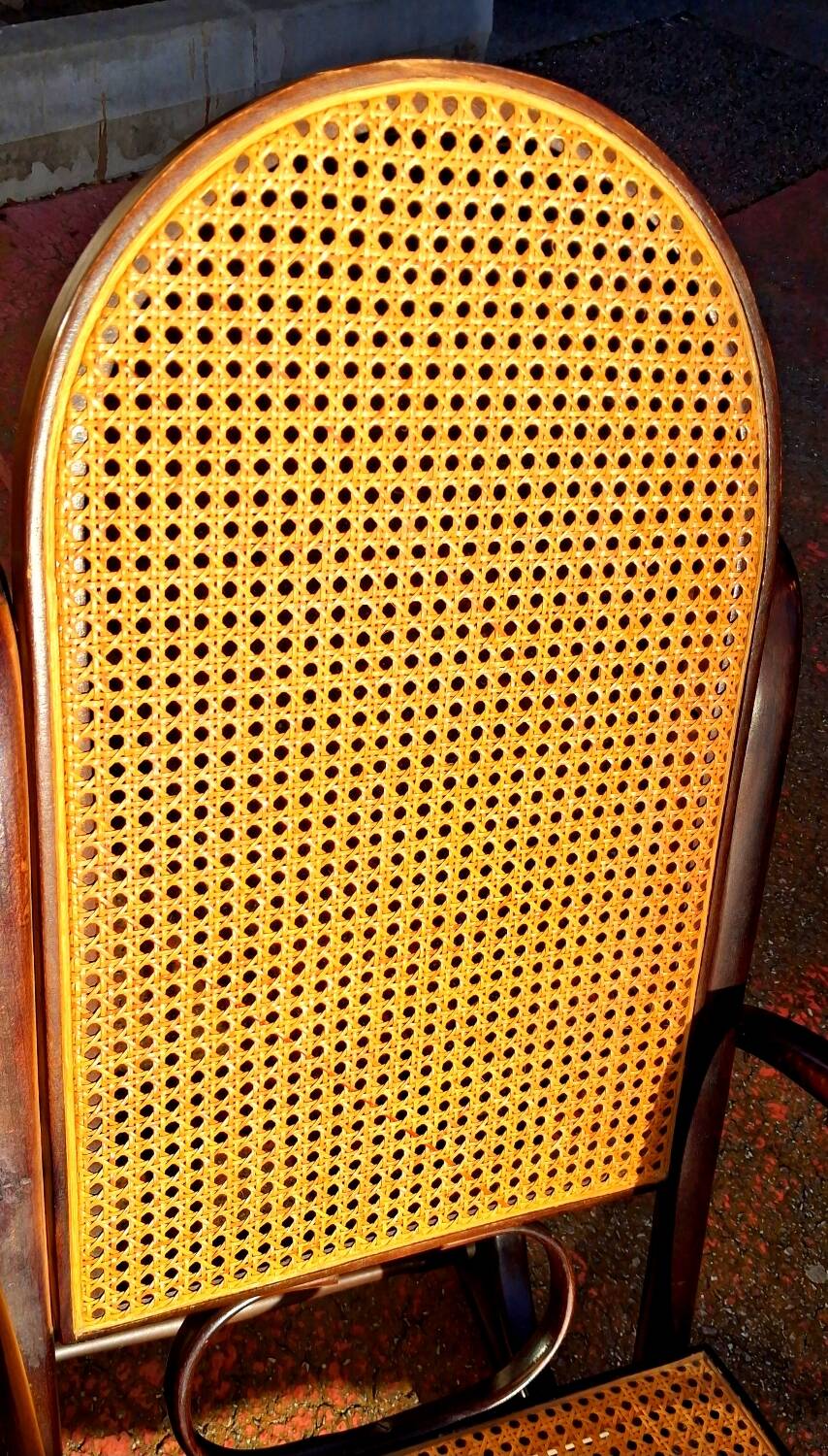 Rocking chair. Bent wood and cane.