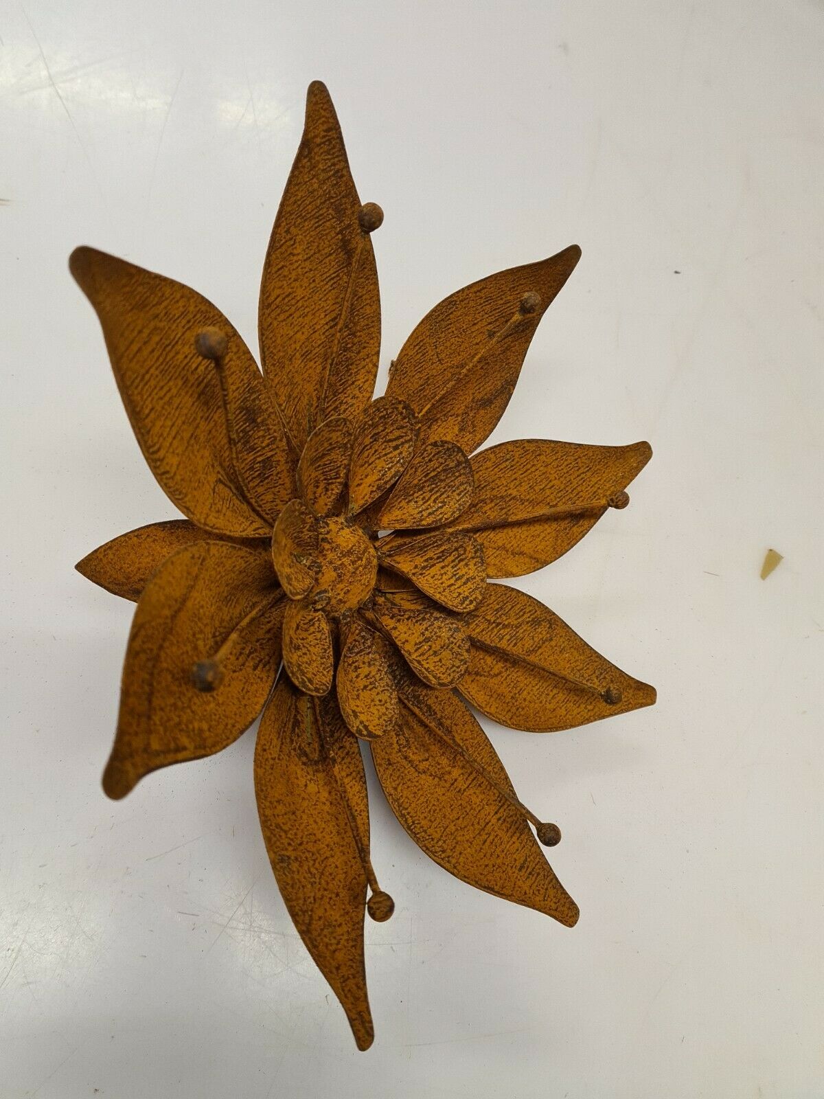 Iron flower on stem, garden decoration