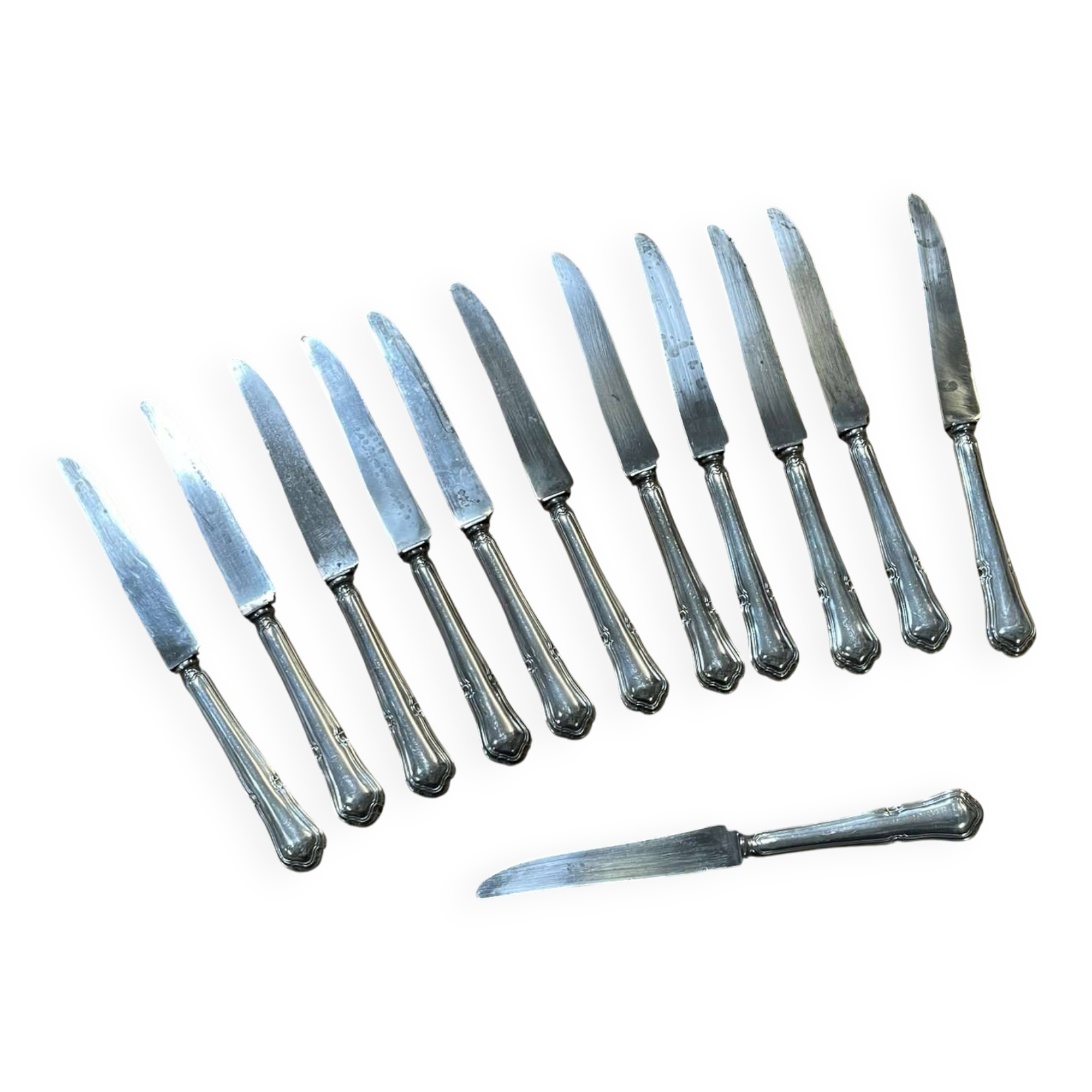 Set of 12 dessert knives in silver metal with steel blades from the early 20th century