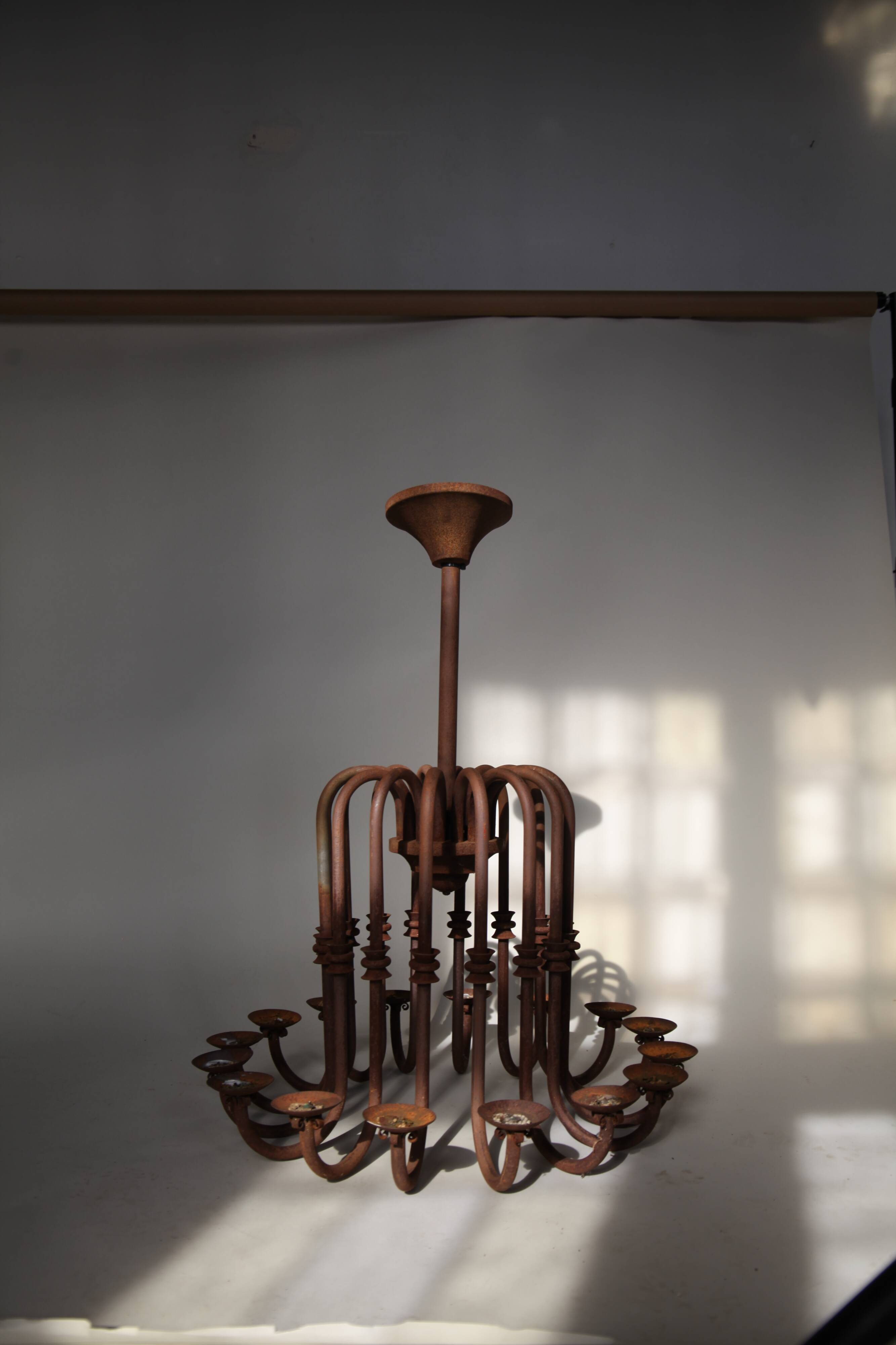 Large antique chandelier with 16 light arms