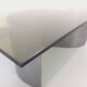 Vintage rectangular Space Age coffee table in steel and smoked glass.