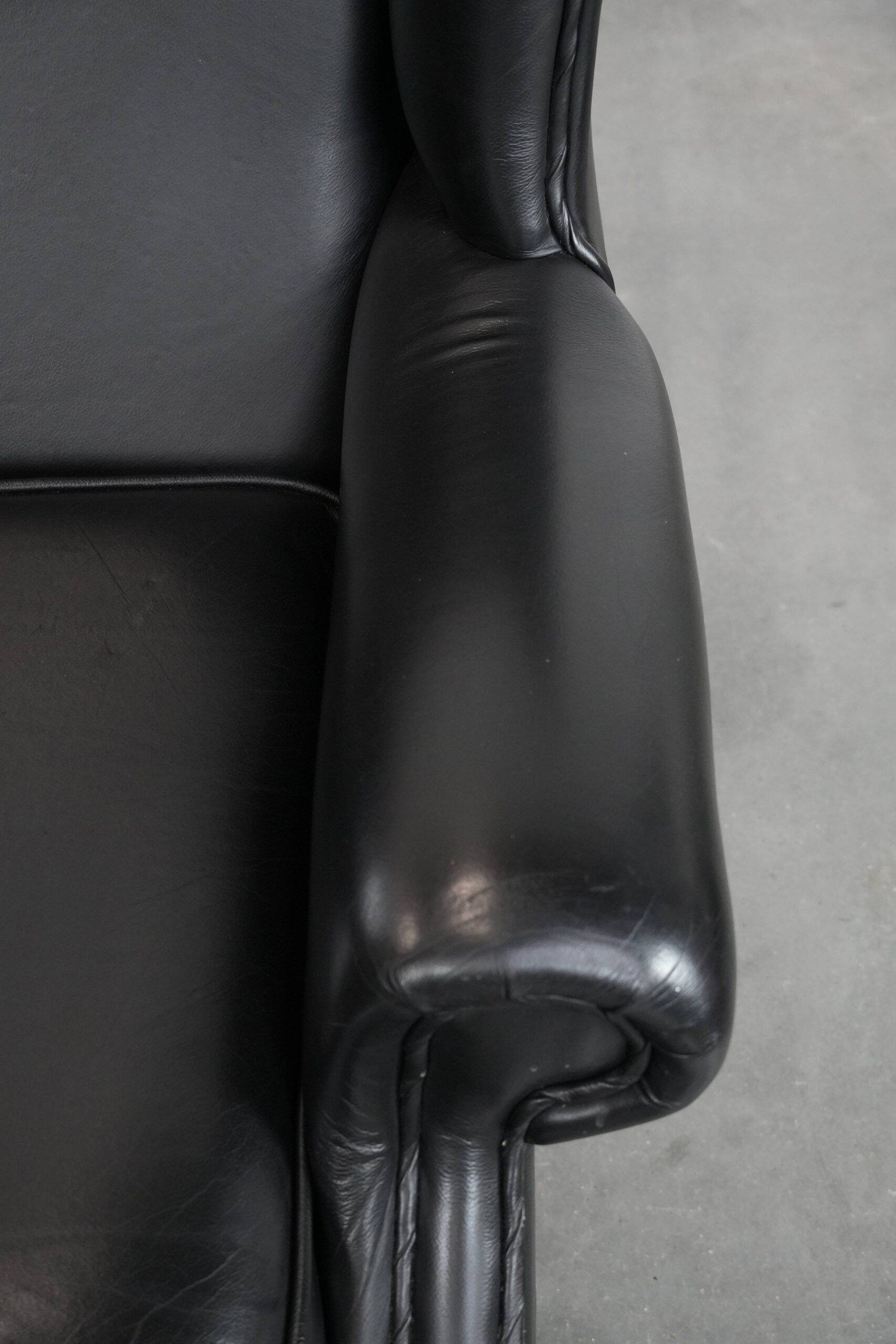 Black cowhide leather Chesterfield wingback chair in English style